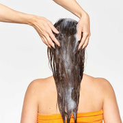 milk-shake-normalizing-blend-shampoo-in-use